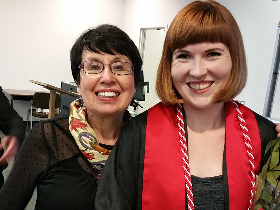 two women at graduation